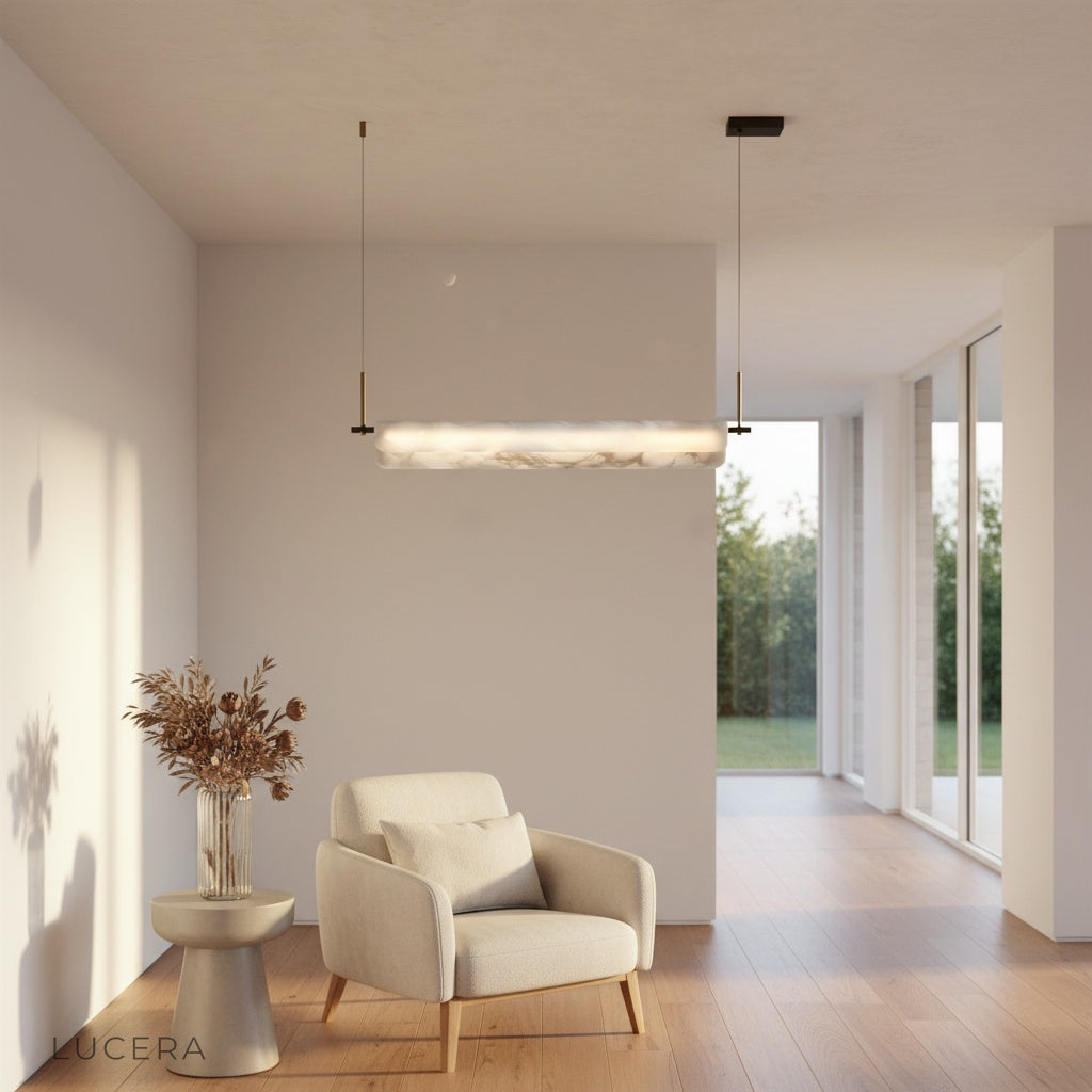 Lucera pendant light suspended above a bedside table in a serene bedroom setting