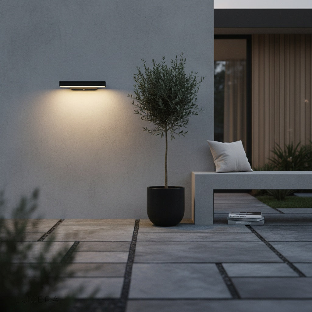 front view of compact die-cast aluminum outdoor sconce with clean lines and matte finish