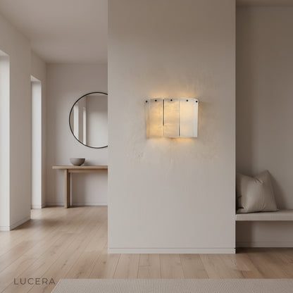 gravitas wall lamp ambient glow at night luxury interior