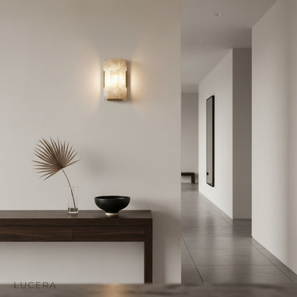 Haut-Médoc wall lamp casting patterned shadows on textured plaster wall at night