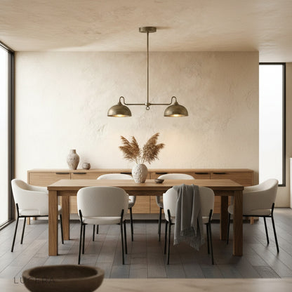 Montepulciano pendant light brass glow above minimalist bedside table in soft evening bedroom setting