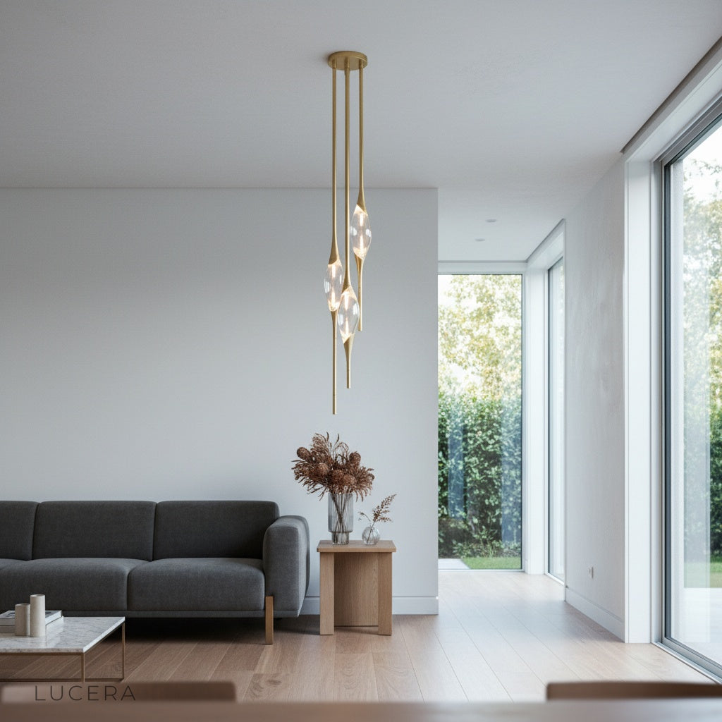 ambient evening shot of Indus pendant light glowing above cozy living room seating area