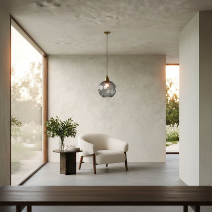 Kronos pendant light at dusk in cozy bedroom, ambient warm light casting shadows