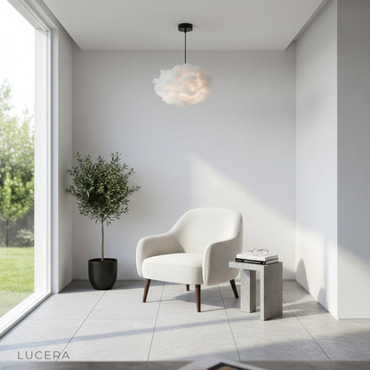 Whimsical Nine pendant light casting ambient evening glow in a serene bedroom retreat, with cloud-inspired shades floating overhead