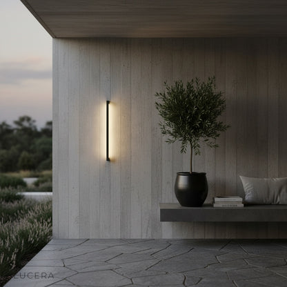 elegant porch corner featuring weatherproof metal lamp in warm evening light