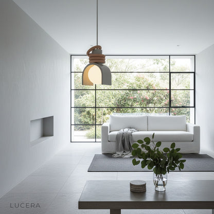 Fornax Dome Pendant Light suspended above a stylish kitchen island in a warm interior setting