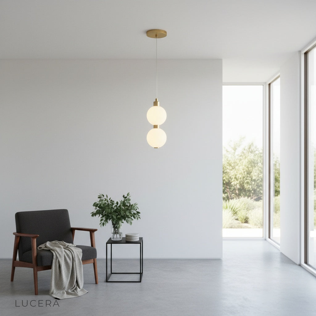 Sere pendant light over minimalist kitchen island with soft evening lighting