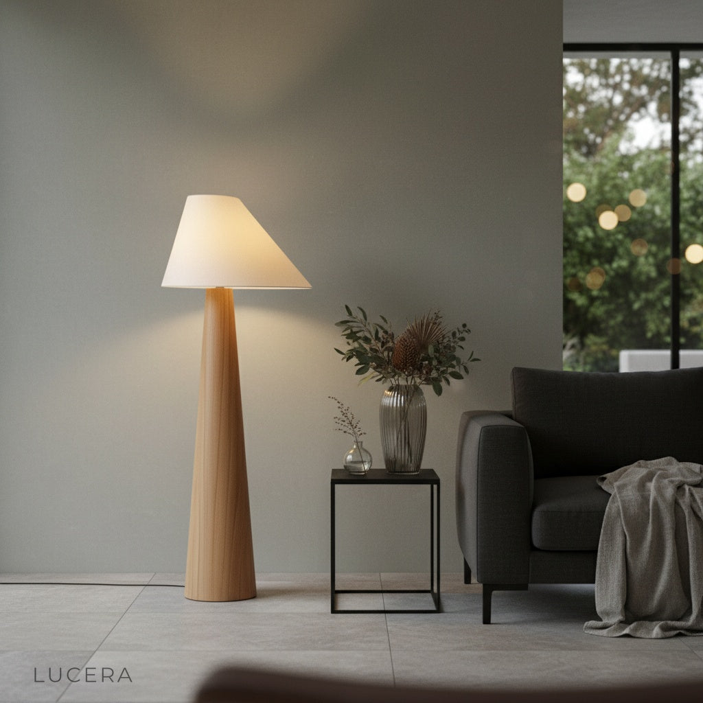 nighttime lifestyle shot of Lucera garden floor lamp glowing in outdoor terrace