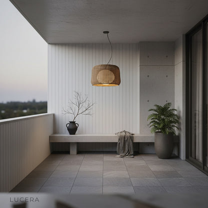 Zealous pendant light lit at dusk on a cozy balcony creating enchanting ambient shadows