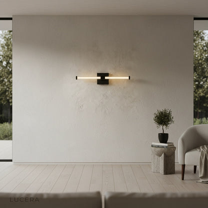 Lucera Effulgent wall lamp pair flanking round mirror in stylish powder room