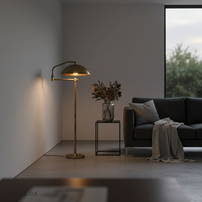 evening shot of sculptural floor lamp illuminating stylish lounge area