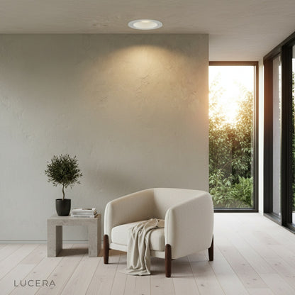 Emerald Downlight casting deep anti-glare light over a kitchen countertop at night