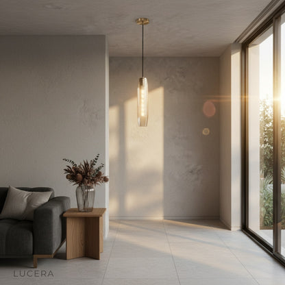 Hester Pendant Light as statement piece above a bedside table in a stylish bedroom
