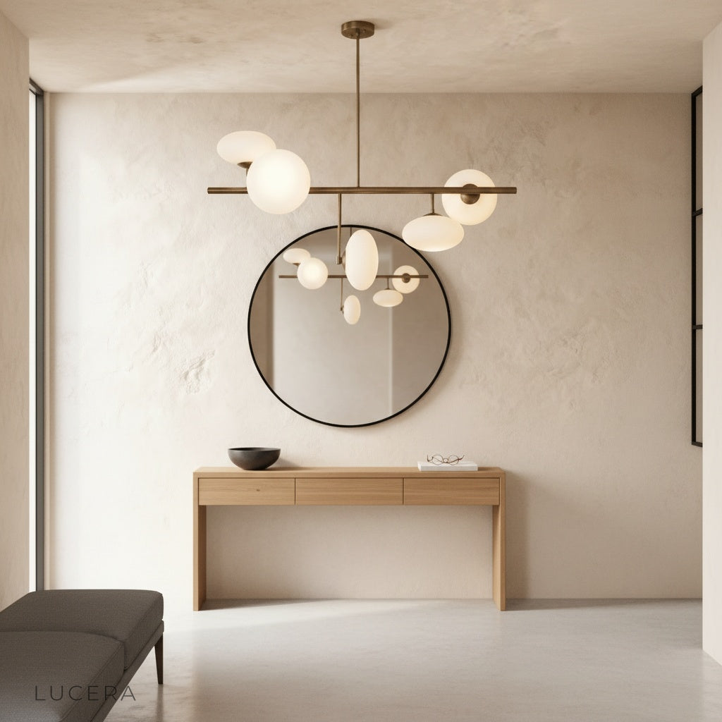 Naples Yellow Chandelier illuminated in bedroom corner with brass and glass reflecting light