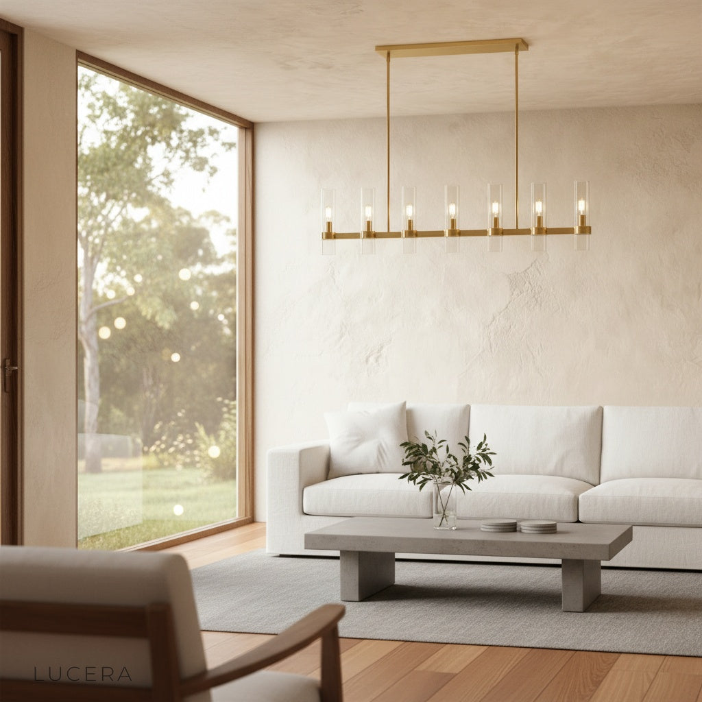 Katarina Candela chandelier glowing in a nighttime living room, cozy sanctuary ambiance