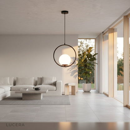 Zigolo pendant light casting ambient shadows on wall in evening lounge setting
