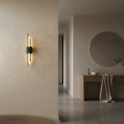 Xyloid wall lamp in bedroom corner casting cozy glow on textured bedding