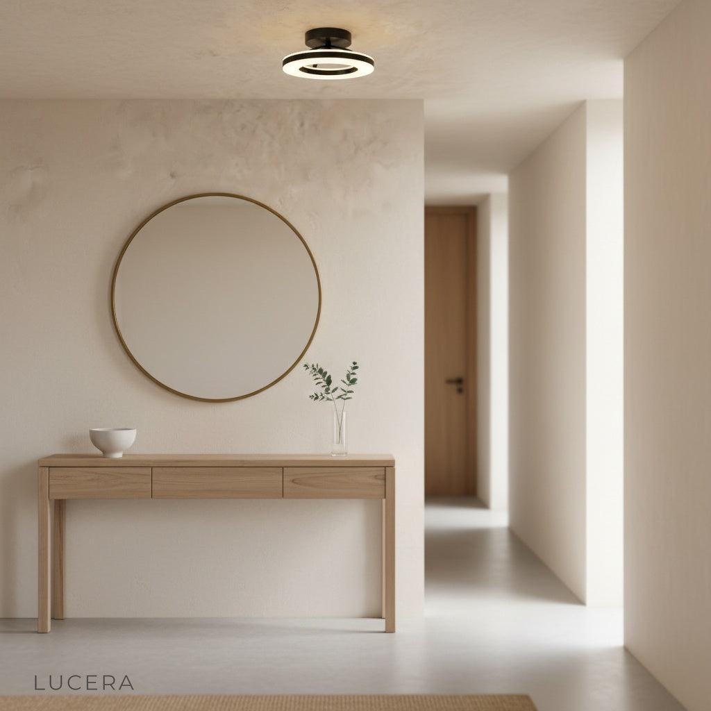 Ziggurat flush mount light enhancing a stylish entryway with reflective floor