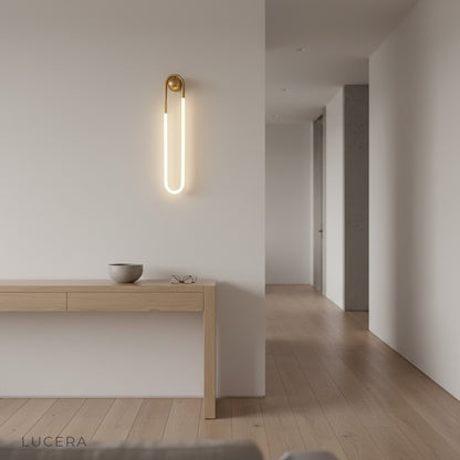 Ximena Wall Lamp in stylish reading nook with warm atmospheric light