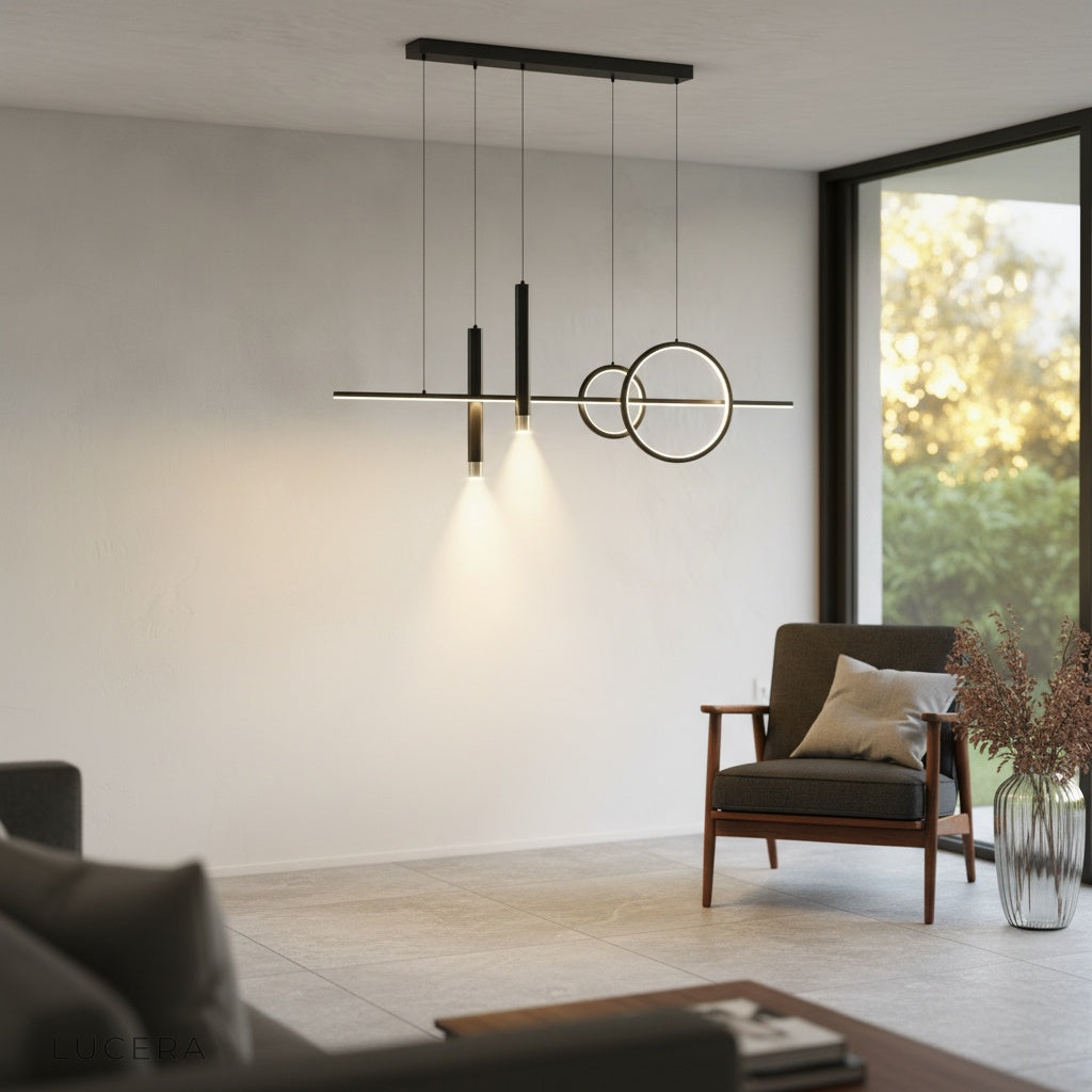 Trim Pendant Light in black over a marble kitchen island, sculptural silhouette against dark wall