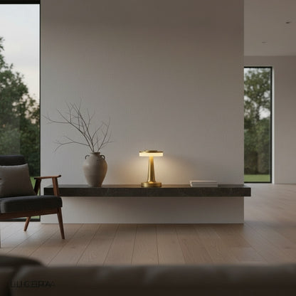 Citadel lamp in cool white mode on kitchen counter, highlighting aluminum finish and compact size