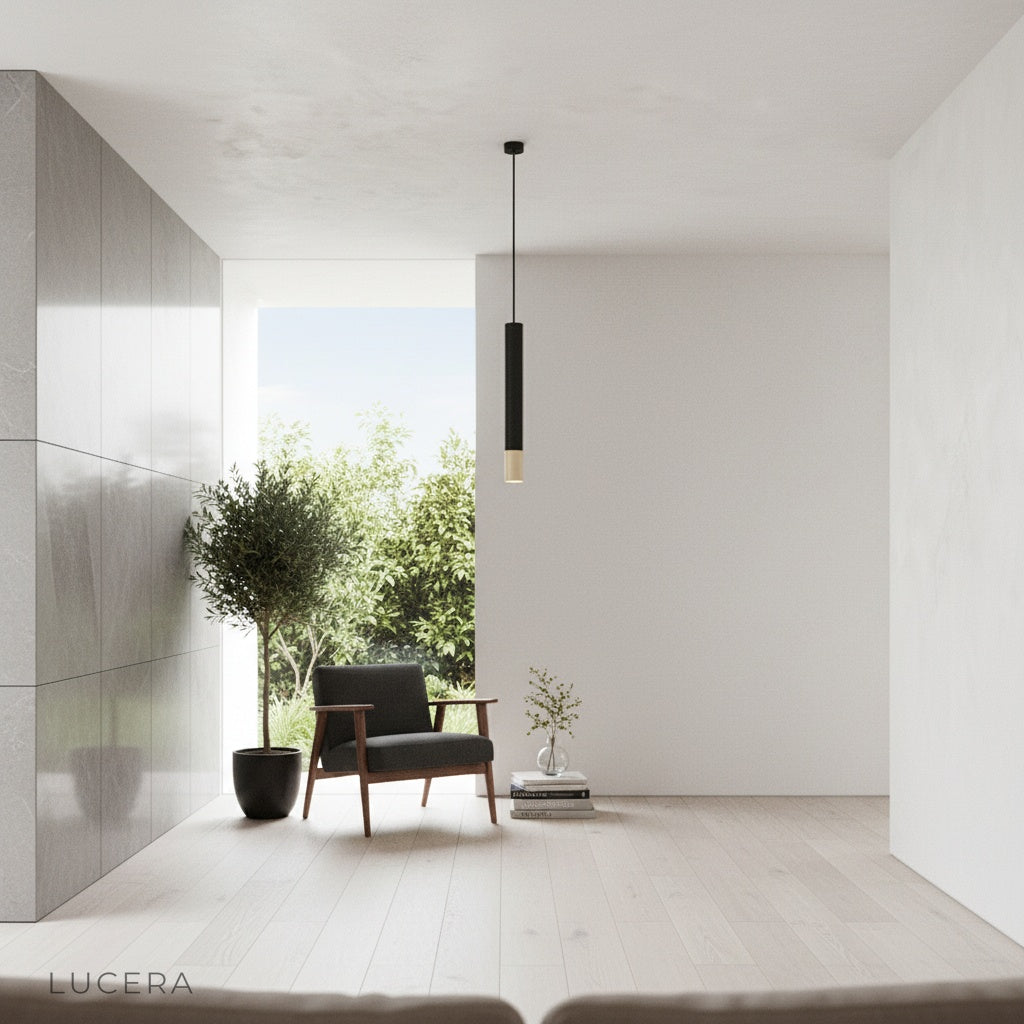 minimalist Fascinate pendant light illuminating a stylish home bar with ambient lighting