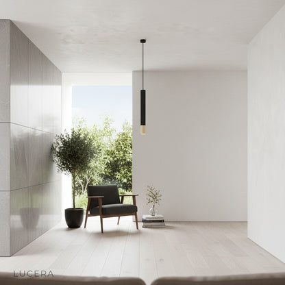 minimalist Fascinate pendant light illuminating a stylish home bar with ambient lighting