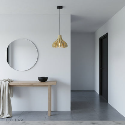 Thibault coral pendant light hanging in minimalist bedroom at night