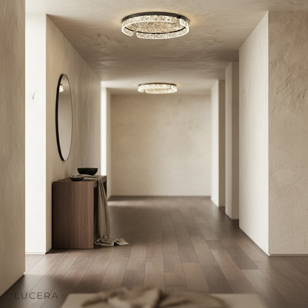 elegant ceiling light above a dining table with soft marbled glass glow