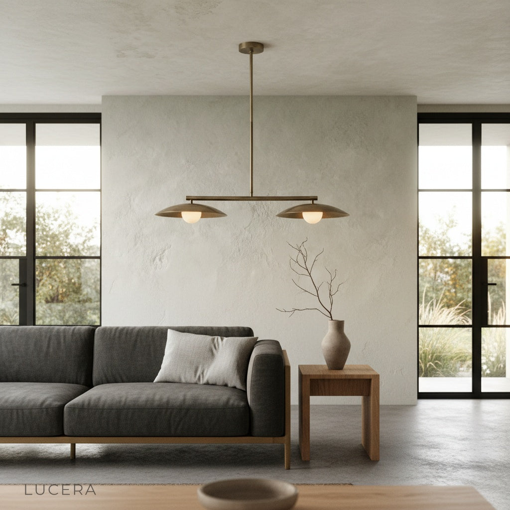 Nighttime ambient shot of the Lucera pendant light with dimmed bulbs in a serene bedroom corner