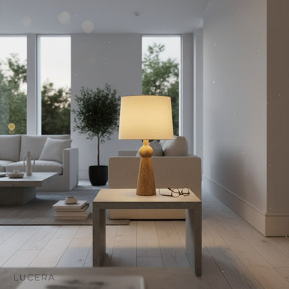 Rhapsody Table Lamp on oak sideboard in bright Scandinavian interior with plants