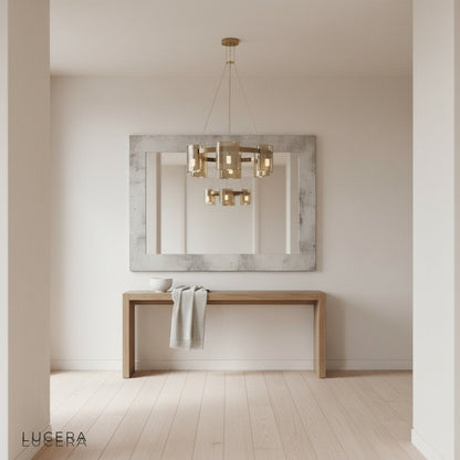 Cardinal Chandelier at dusk casting warm light in an elegant foyer entryway