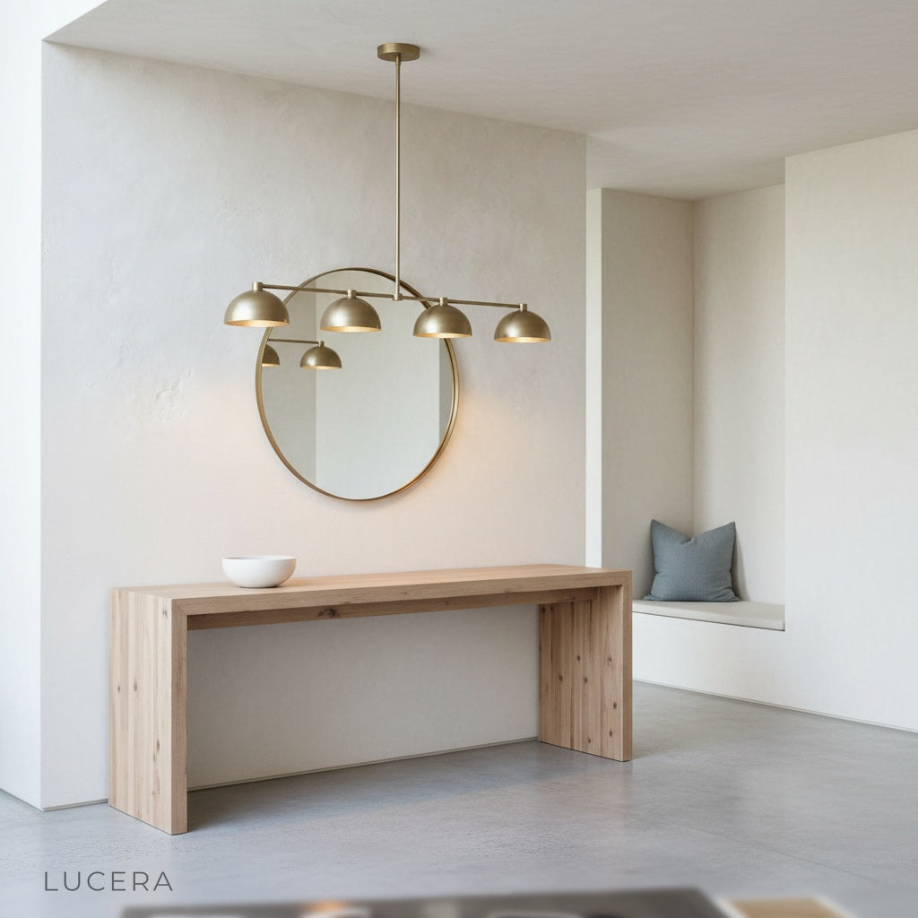 Nighttime lifestyle shot of Lucera Ursule linear pendant light in elegant dining space