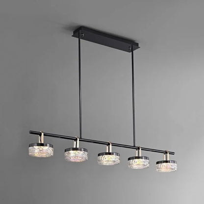 Studio shot of linear LED chandelier against clean white background showing full length